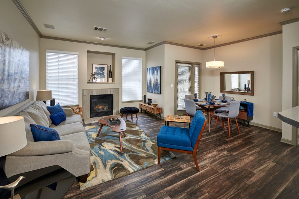 A living room with hardwood-style floors at Gateway Park Apartments in Denver, Colorado